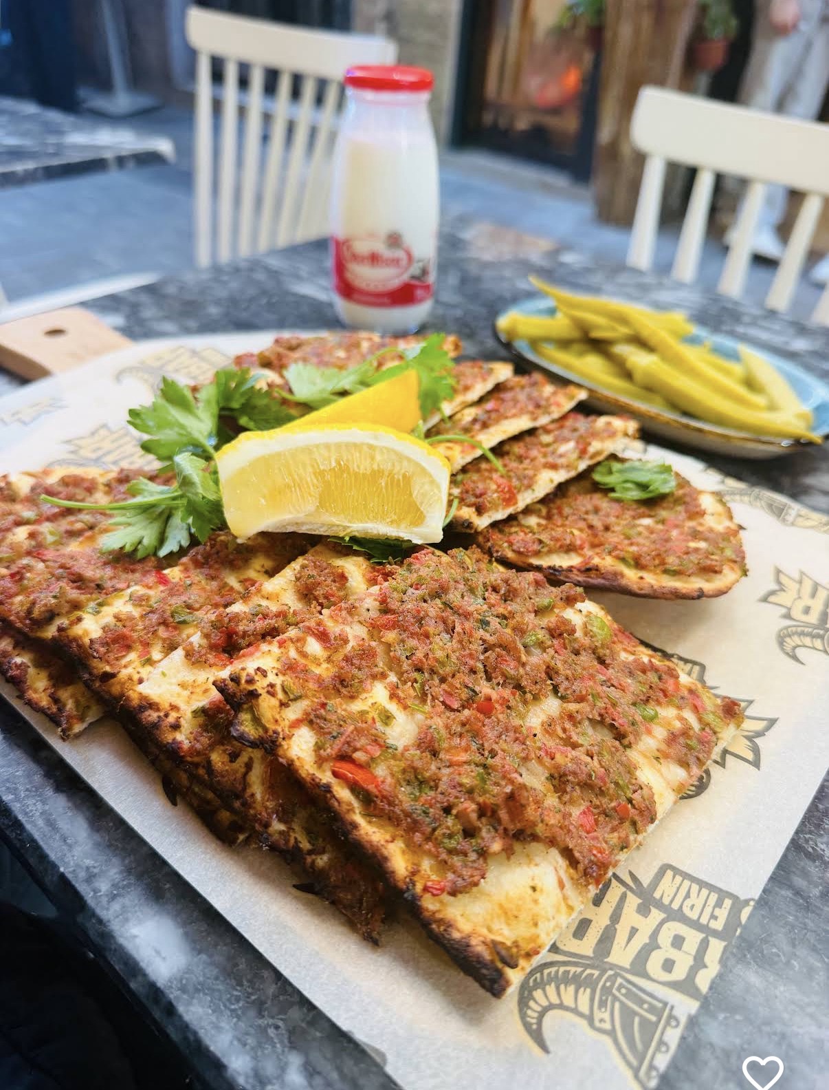 Crisp lahmacun with parsley and lemon